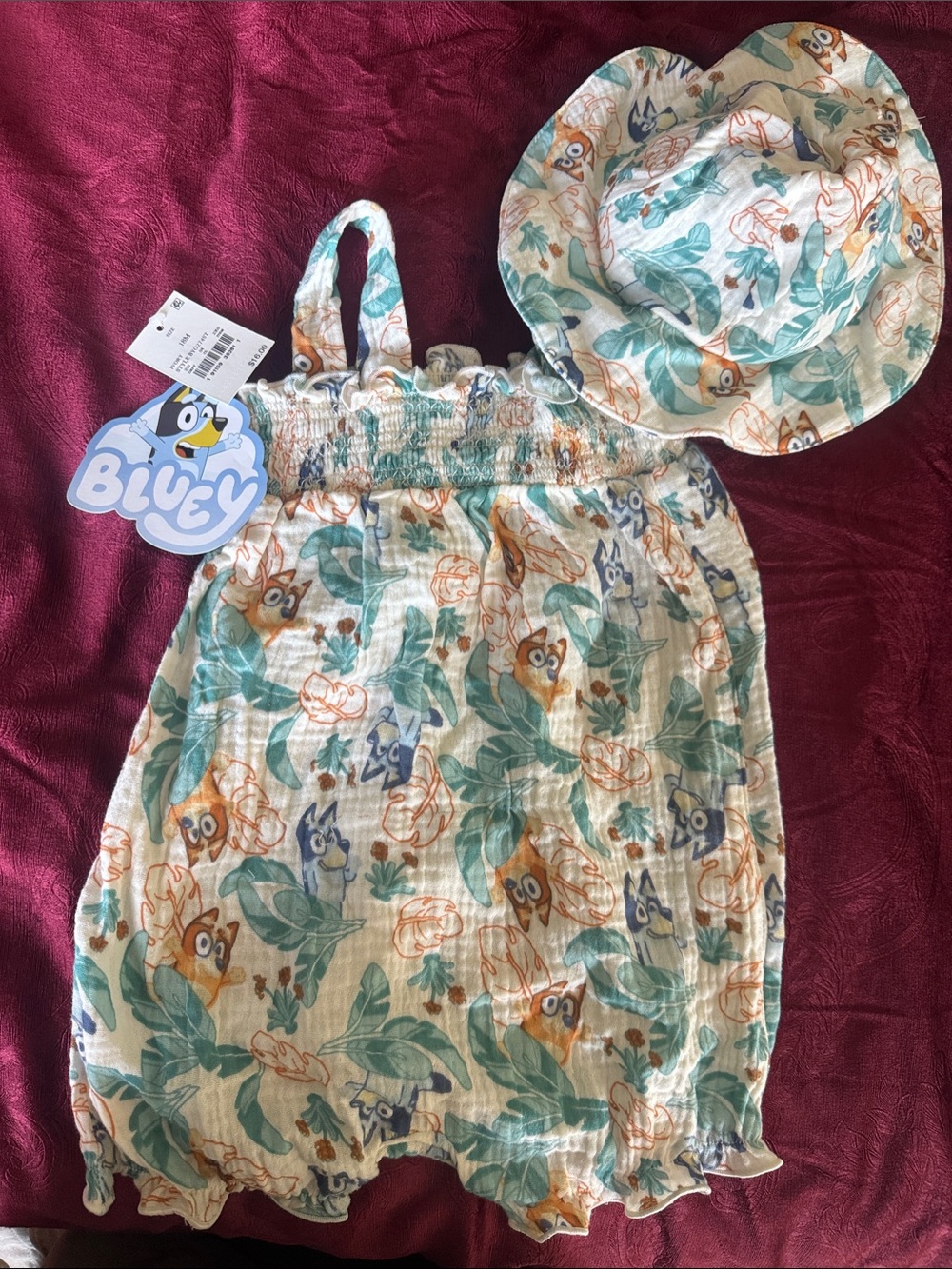 Bluey Kids Cream Romper with Teal and Orange Jungle Print and Matching Hat